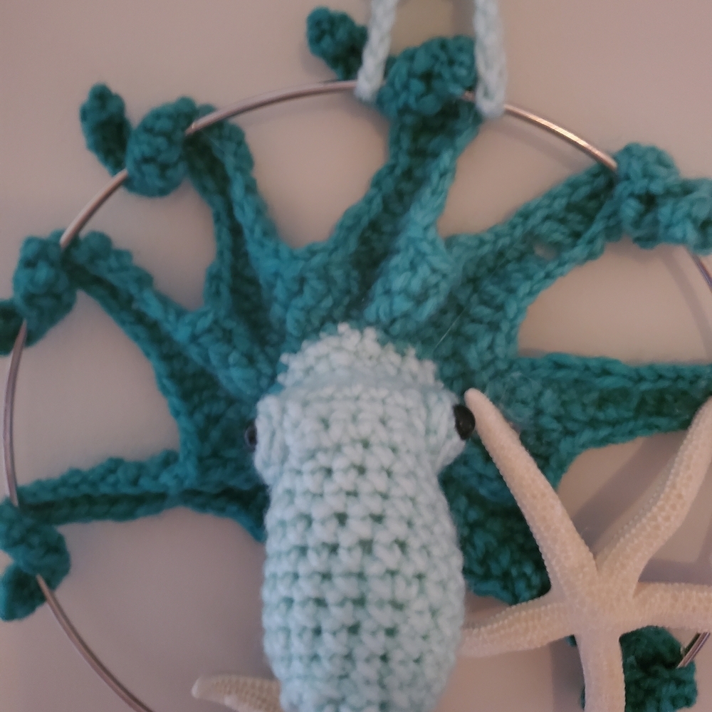 Handmade Crochet Sea Star Wall Hanging in Teal and Light Blue - Picture 2 of 11